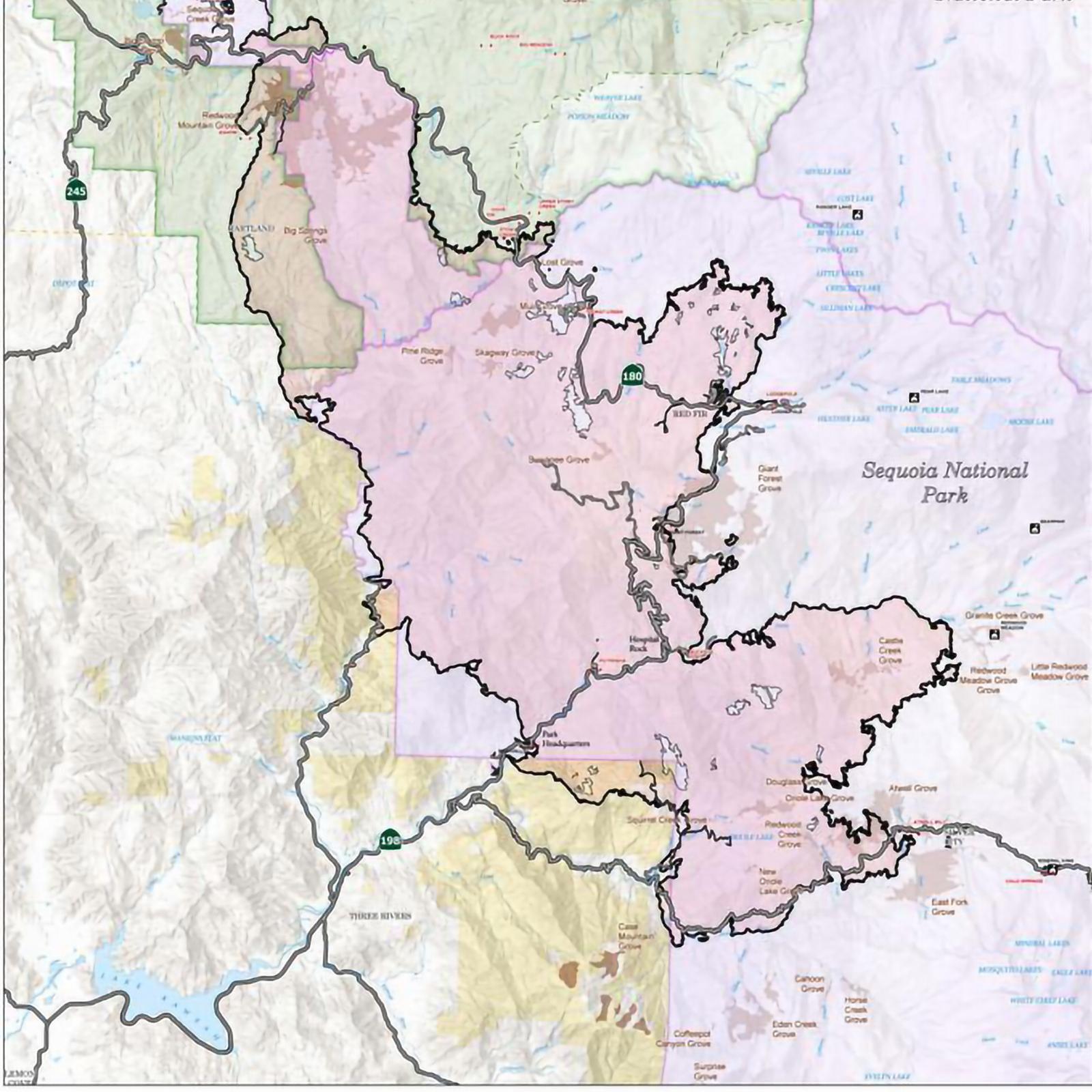 A distant view of a map with different color shapes. Text is too small and unreadable.
