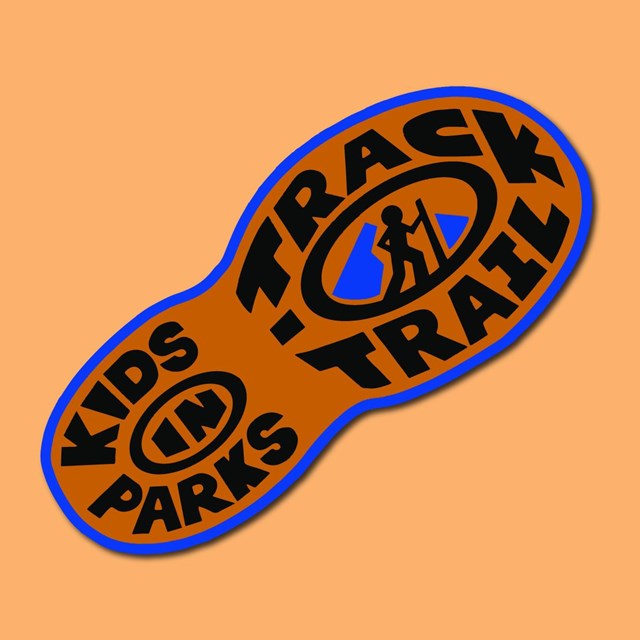 A logo for Kids in Parks, Track Trail