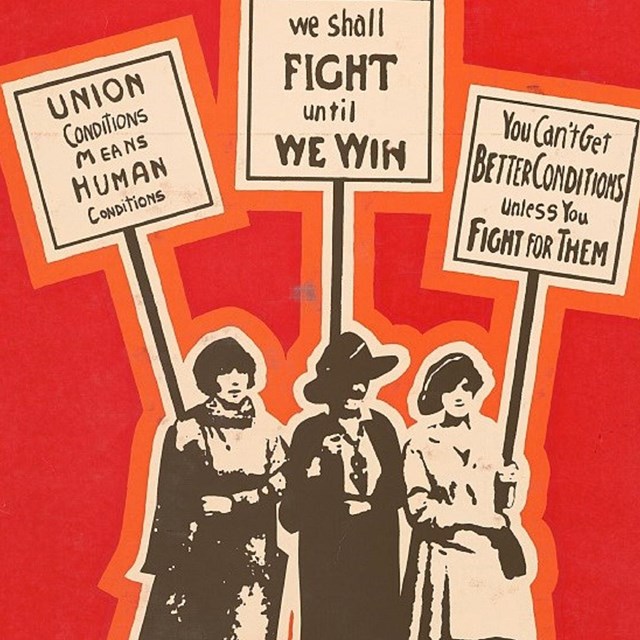 Women holding posters 