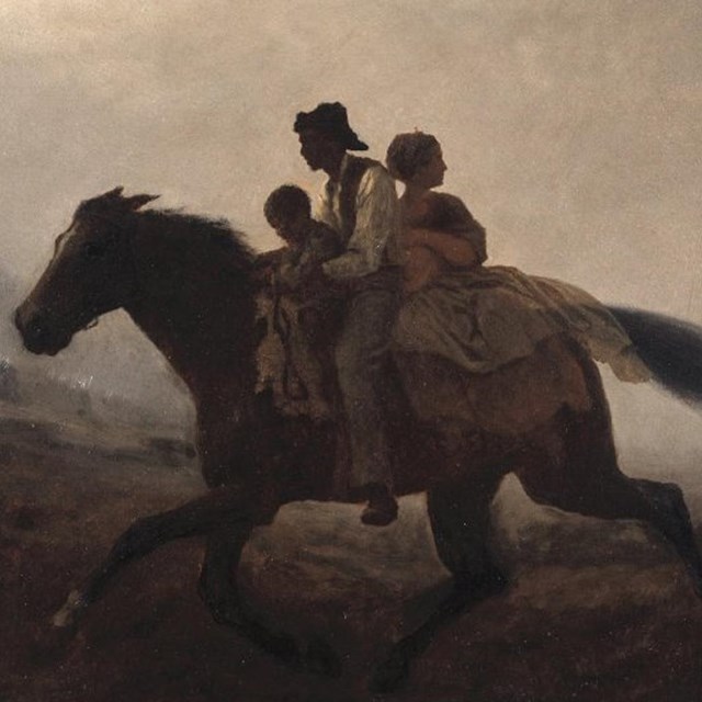 People on horseback. 