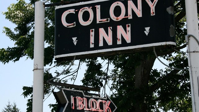 neon sign for the colony inn, which once operated in the amana hotel