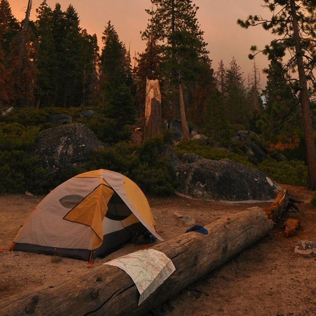 Tent at sunset in the wilderness
