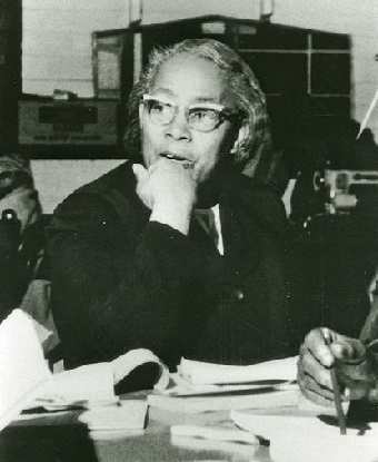 Septima Clark at a desk with papers on it. 