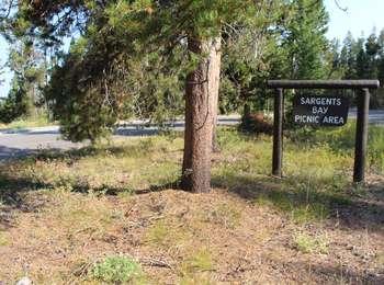 Brown wooden sign for Sargents Bay Picnic Area along north highway.