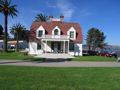 Manicured lawns surround the Officer in Charge Quarters.