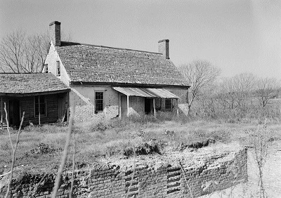 Historic photo of one of the remaining brick dependencies at Kingsmill Plantation