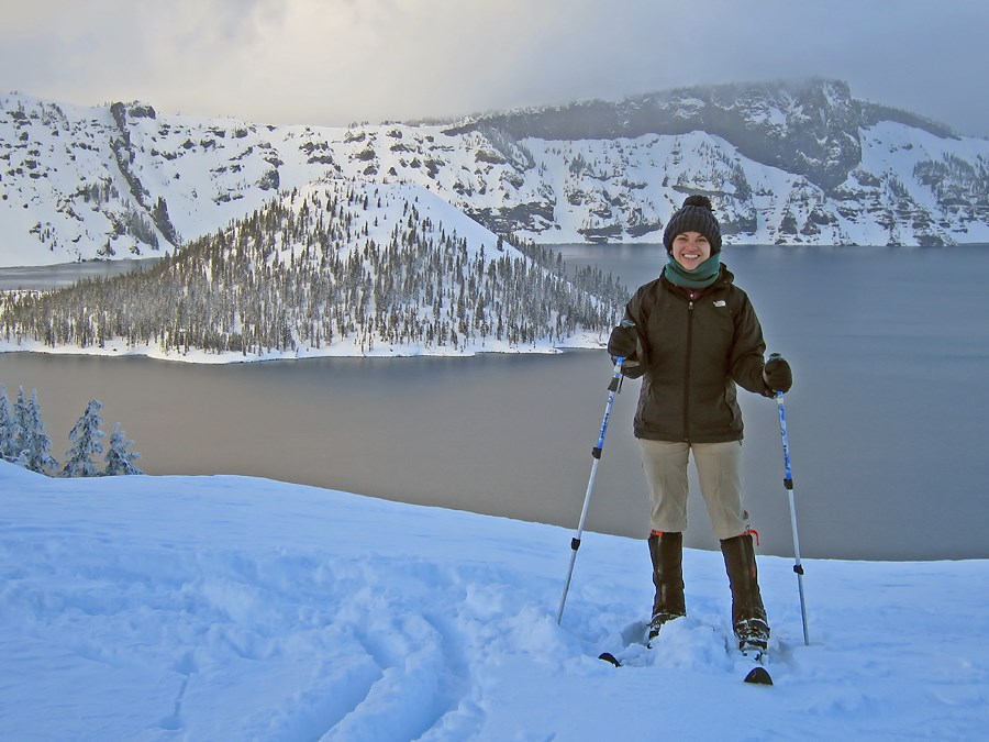 A Skier Stands on the Rim of Crater Lake