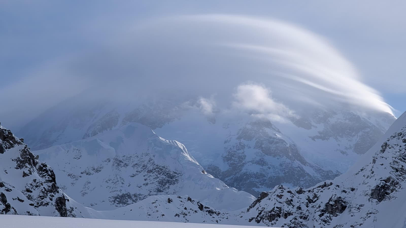 A lingering lenticular cloud sits atop Mt. McKinley. Photo: K. Ramos-Leon