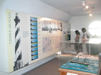 Couple views exhibits in museum.