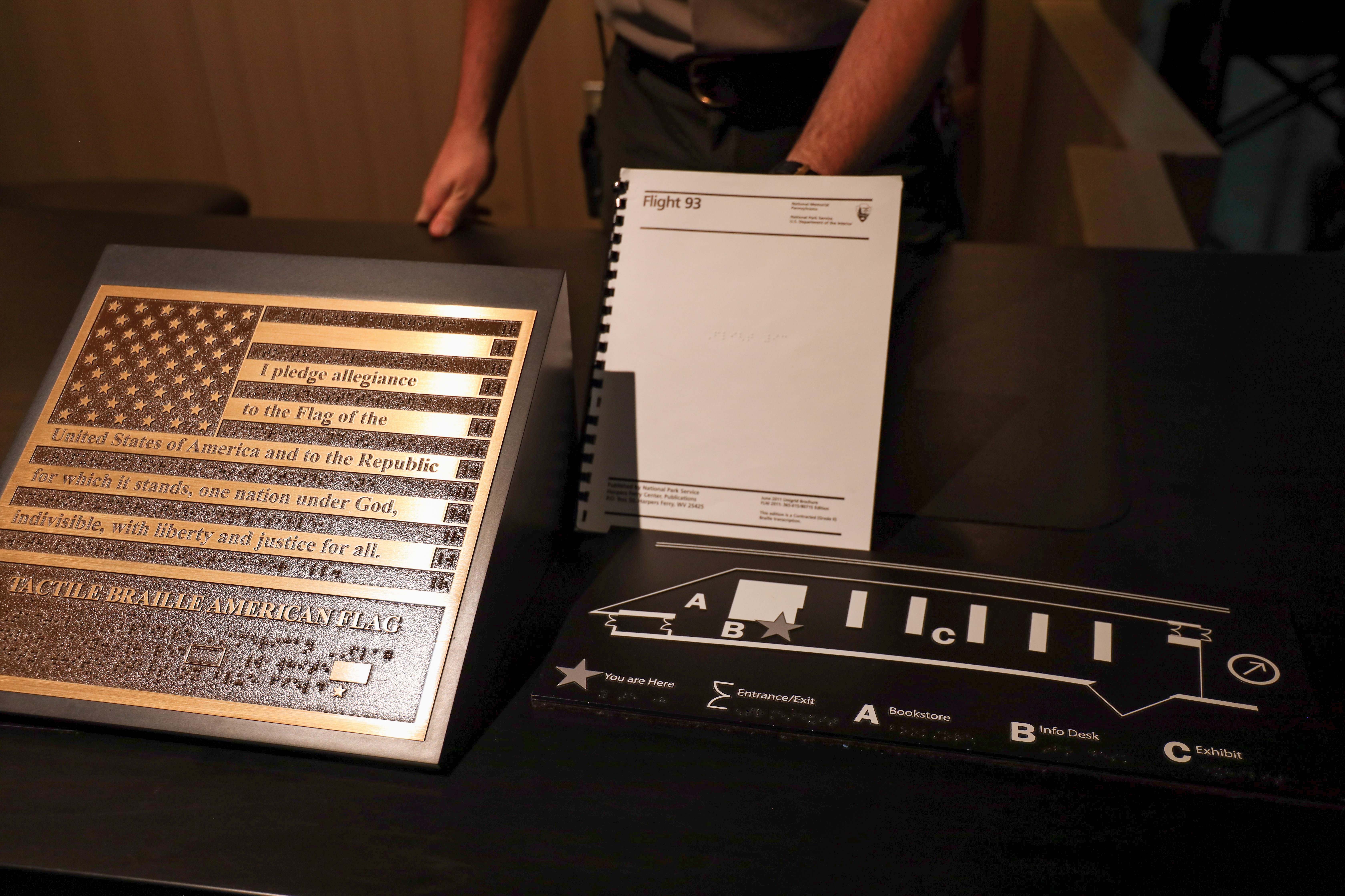 Braille American flag, Braille park brochure and Braille visitor center layout map