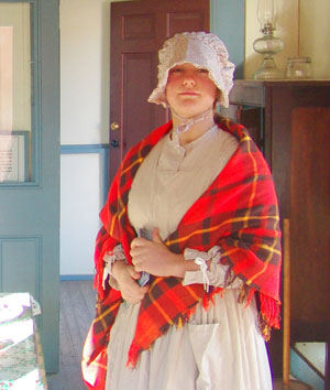  Volunteer portraying a servant in the kitchen at Fort Davis.