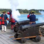 Volunteer re-renactors fire the cannon during one of the Living History Days at Fort Matanzas.