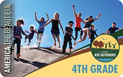 Front of the 2019-20 4th Grade Pass depicts nine children leaping down a sand dune.