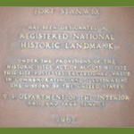 a brassy plaque, with greenish cooper spreading on it. Engraved: 
