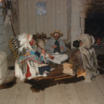 living history interpreters doing historic trading in trade house.