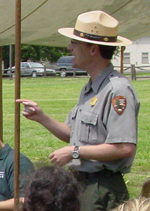 Image of Greg Shine presenting an interpretive talk to the public
