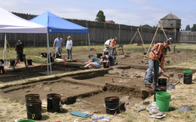 Landscape image of an active archaeology dig inside the stockade walls in 2006.