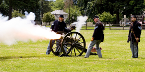 Image of the mountain howitzer firing