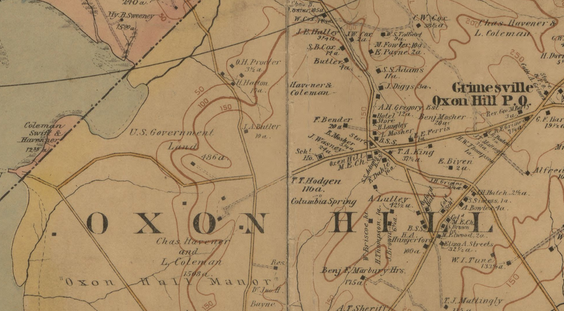 An old map shows an area title 'Oxon Hill'. Land is colored tan and water blue. In the top left corner of the map, a piece of land is marked 'US Government Land'. To the right (west) of that are three properties. Starting from the top, two rectangles, sig