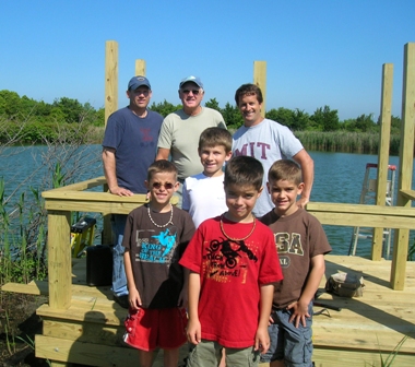 Volunteers work on a variety of park projects, like rebuilding with wildlife viewing platfrom at Sandy Hook.