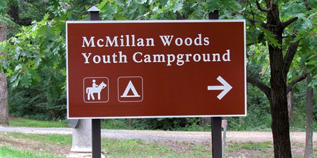 McMillan Woods Youth Campground sign