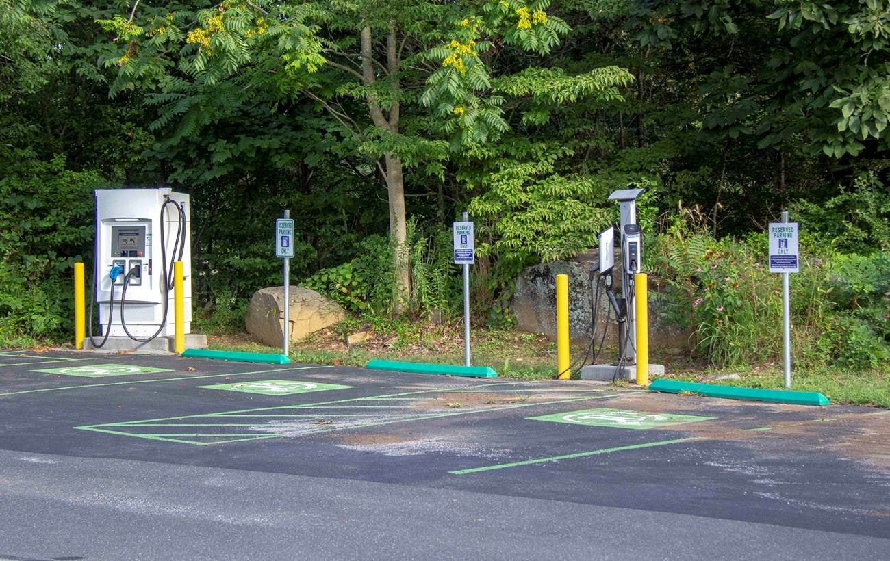 A electric vehicle charging station with 2 charger and four spots.
