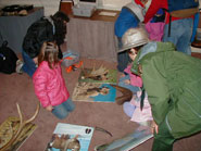 Ranger showing child different antlers