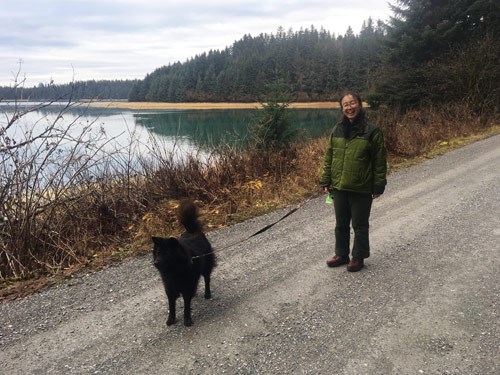 Visitor with dog in Bartlett Cove