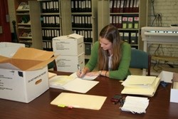 A patron researching Army Records at the Park Archives and Records Center.