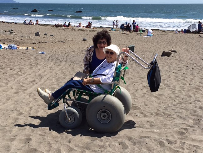Image of women in a beach wheelchair at Muir Beach