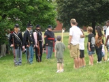 Children of all ages participate in a historic drilling session with NPS living historians.