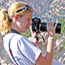 Woman photographing the Grand Canyon.