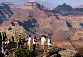 visitors viewing grand canyon