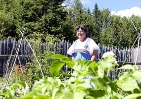 The historic gardener at Grand Portage enjoys tending garden vegetable varieties in the kitchen gardens. The historic gardener at Grand Portage enjoys tending garden vegetable varieties in the kitchen gardens.