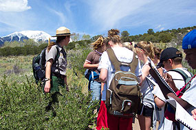 Education Specialist with children on a school field trip