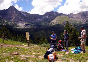 Backpackers get advice from a ranger at Music Pass, Great Sand Dunes National Preserve