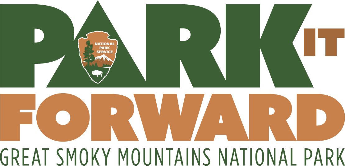 green and brown park it forward logo