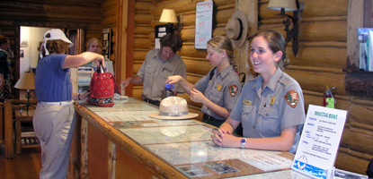 Jenny Lake Visitor Center Naturalists at information desk.