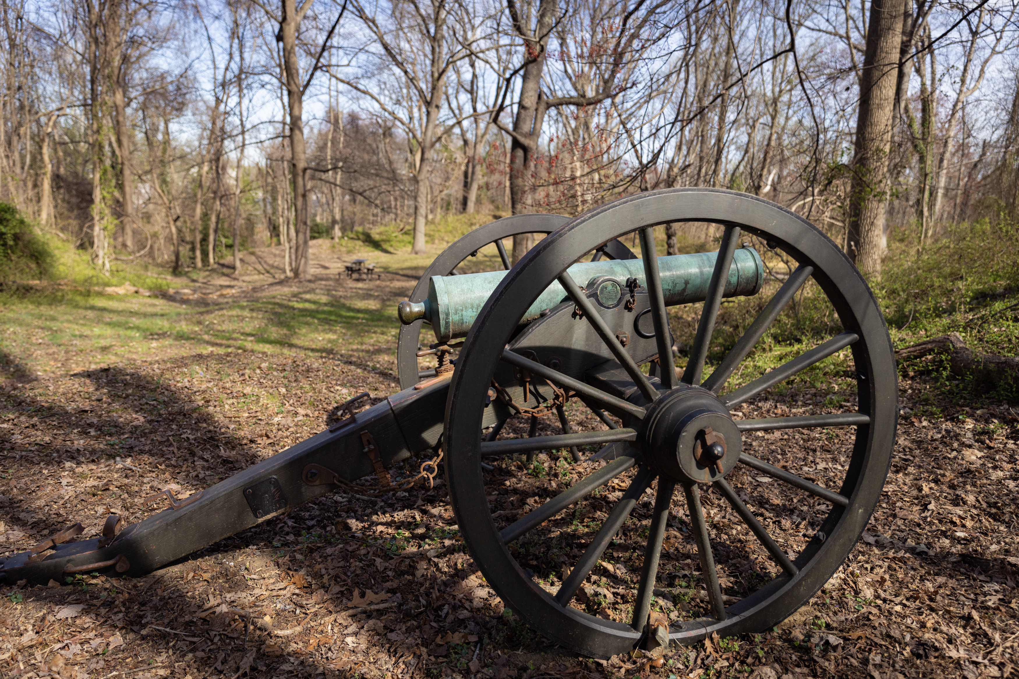 Earthworks, cannon, and bench at Fort Marcy