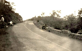 Civilian Conservation Corp workers build stone walls along Crater Rim Drive