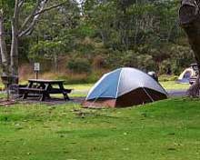 Tent with picnic table in Namakanipaio Campground