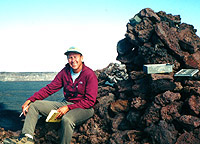 Steve signs the log at the summit cairn