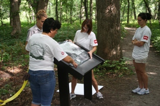 Exmark Volunteers install wayside exibit. Exmark Volunteers install wayside exibit.