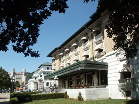 Exterior of Fordyce Bathhouse, looking north, with the Maurice Bathhouse and Arlington Hotel in background.