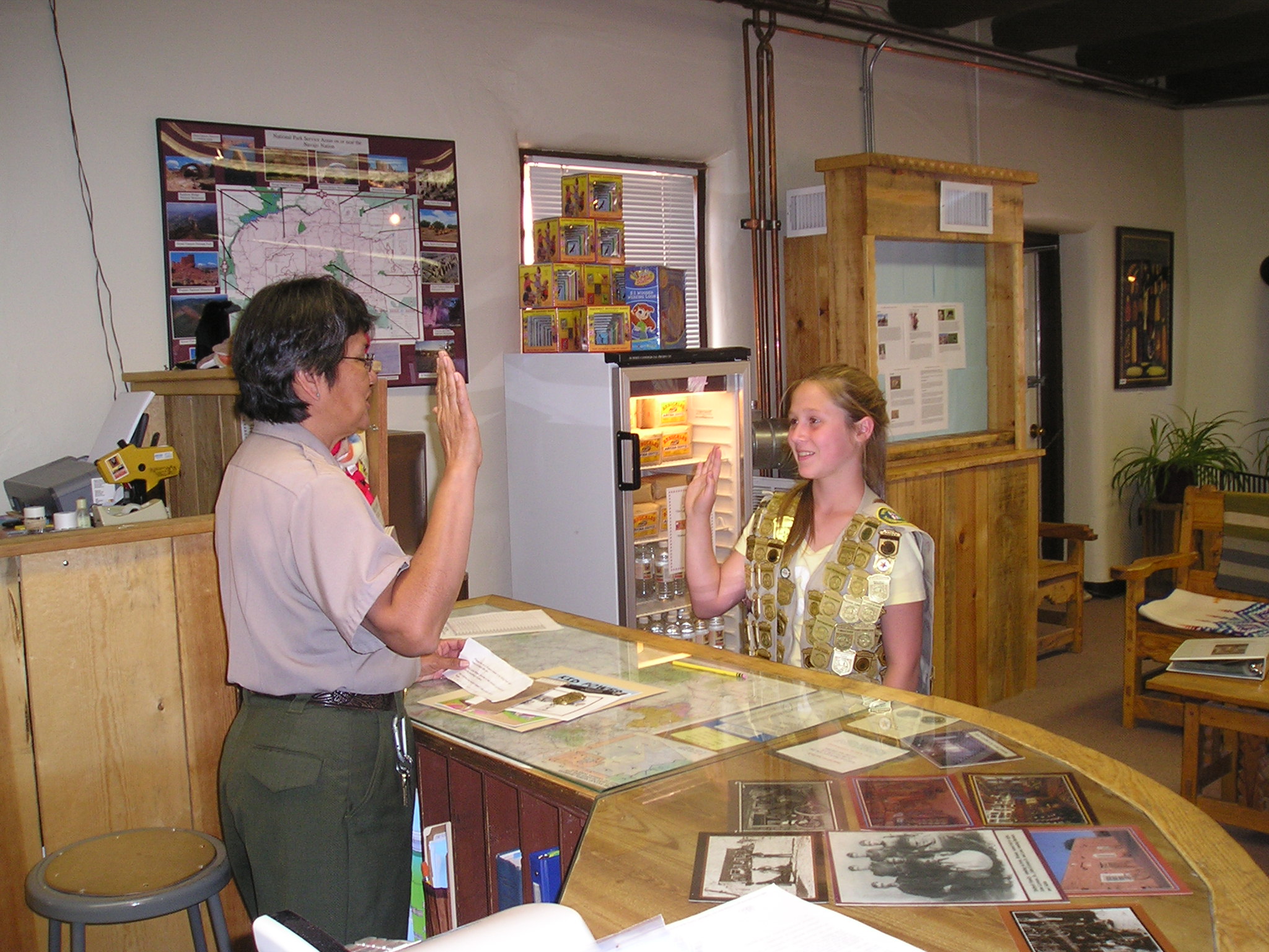 Ranger Tina swearing in a Junior Ranger.