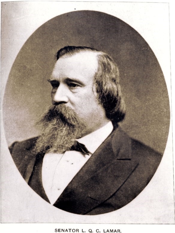 man sitting is facing to the right