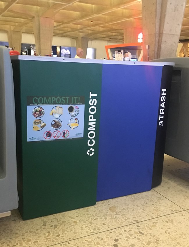 bins located in the public spaces of the Arch Café that hold compost, recycling, and trash