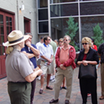Ranger talks to group in French Quarter Visitor Center courtyard
