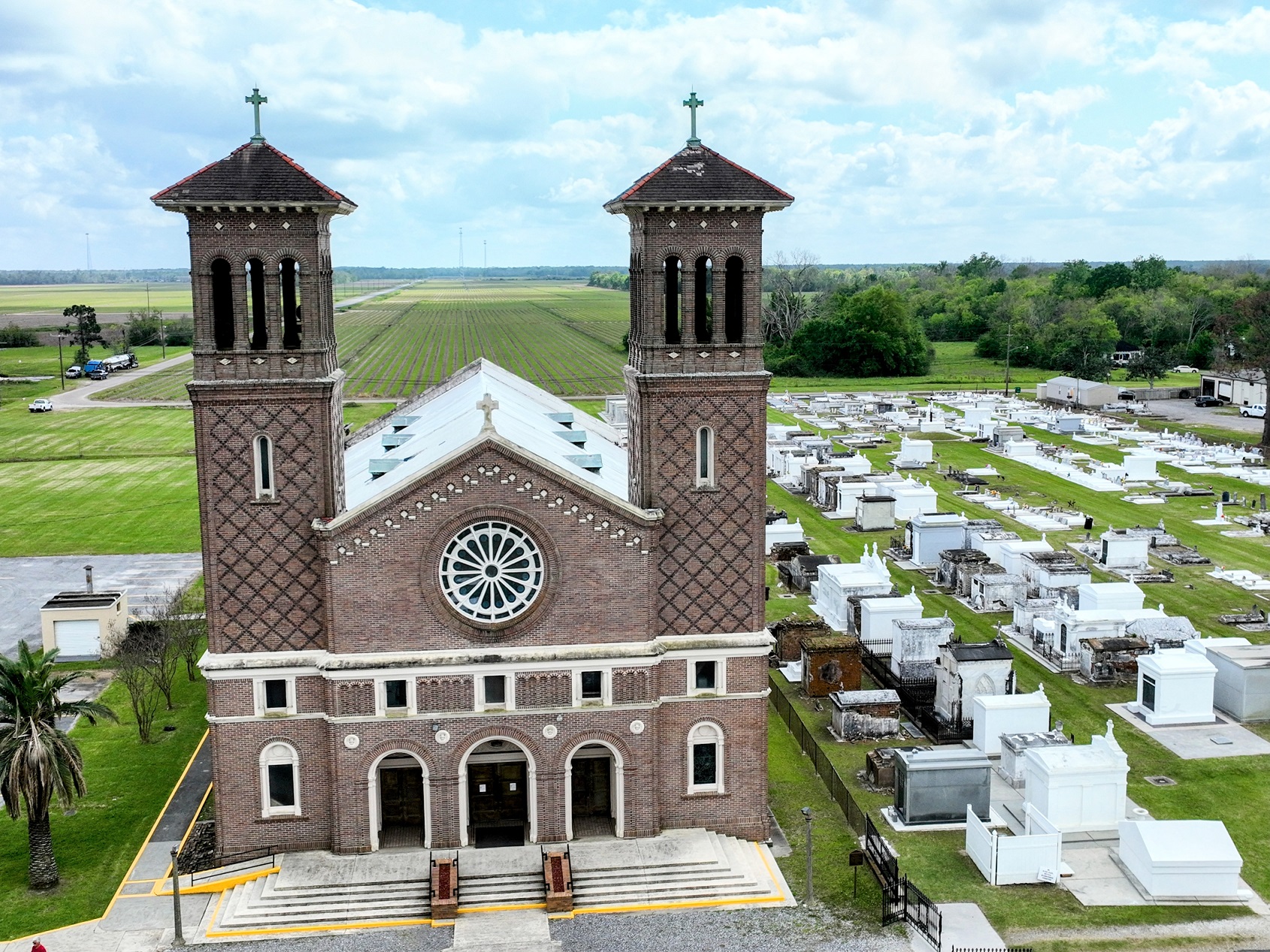 masonry church next to cemetery