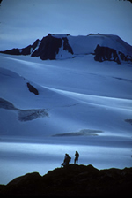 Hikers at the edge of the vast Harding Icefield